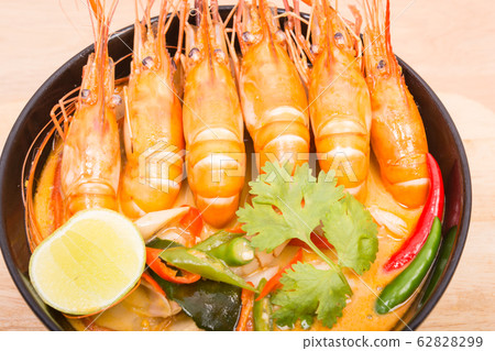 Tom Yum Goong, Thai hot spicy soup shrimp on Black 62828299
