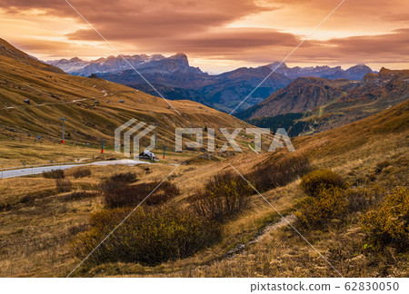Autumn alpine Dolomites mountain scene near Pordoi Autumn alpine Dolomites mountain scene near Pordoi 62830050
