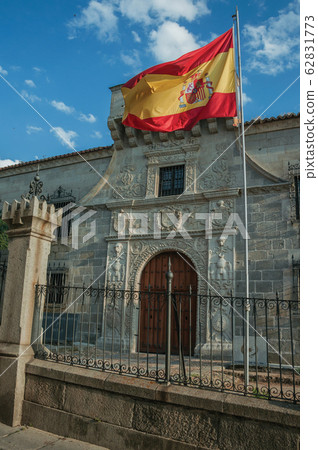 Old building facade with Spanish flag in Avila Old building facade with Spanish flag in Avila 62831773