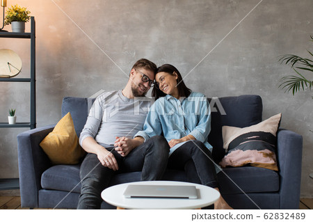 Happy Young Couple Looking at the Camera. Man and Woman are Happy. Happy Young Couple Looking at the Camera. Man and Woman are Happy. 62832489