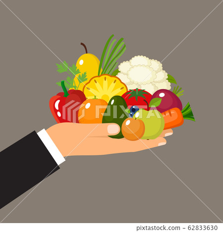 Hand holds fruits and vegetables. Vitamins Healthy Hand holds fruits and vegetables. Vitamins Healthy 62833630