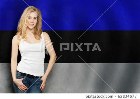 Estonia. Happy blonde girl showing white banner Estonia. Happy blonde girl showing white banner 62834675