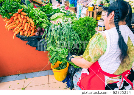 Traditional ecuadorian food market selling agricultural products and other food items in Cuenca 62835234
