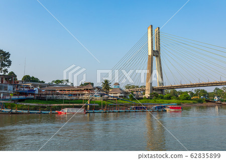 View of the bridge of El Coca on the Napo River. 62835899