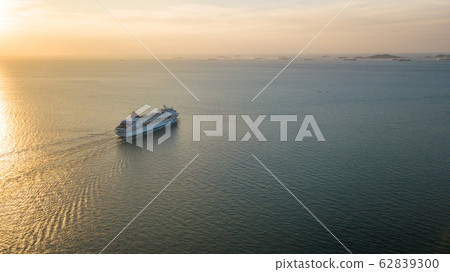 Aerial view Cruise ship at sunset in ocean, Aerial 62839300