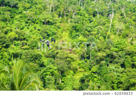 Drone in the Air over Green rain forest jungle Drone in the Air over Green rain forest jungle 62839833