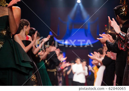 Fashion Models walk back Finale on Runway Ramp 62840065