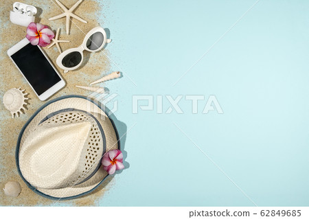 Summer holiday concept on light blue background Summer holiday concept on light blue background 62849685
