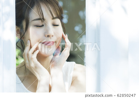 Woman morning morning wake up window beauty lifestyle 62850247
