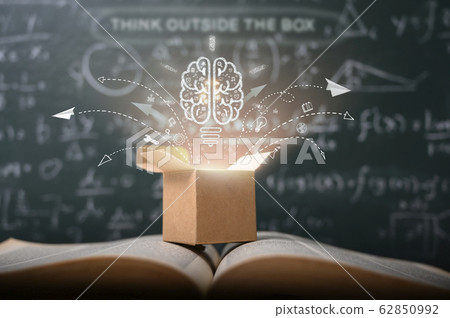 think outside the box on school green blackboard . think outside the box on school green blackboard . 62850992