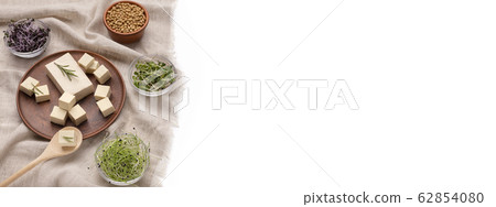Fresh tofu, microgreens top view white background Fresh tofu, microgreens top view white background 62854080