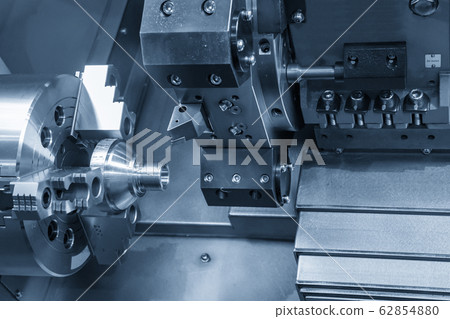 The CNC lathe machine in metal working process. 62854880