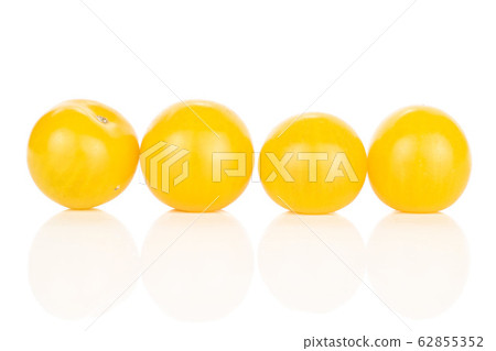 Fresh yellow tomato isolated on white Fresh yellow tomato isolated on white 62855352