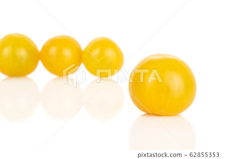 Fresh yellow tomato isolated on white Fresh yellow tomato isolated on white 62855353