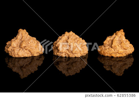 Coconut chocolate biscuit isolated on black glass Coconut chocolate biscuit isolated on black glass 62855386