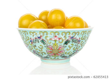 Fresh yellow tomato isolated on white Fresh yellow tomato isolated on white 62855413