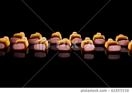 Sweet jelly cola isolated on black glass Sweet jelly cola isolated on black glass 62855538