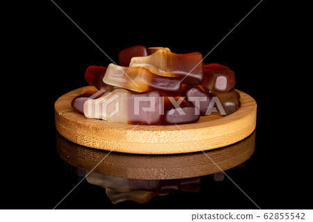 Sweet jelly cola isolated on black glass 62855542