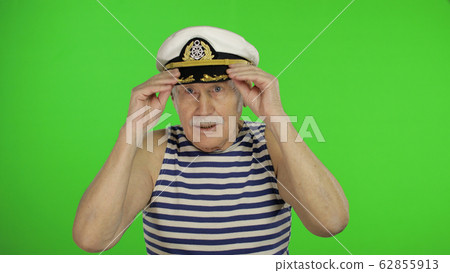 Elderly sailor man in hat with mustache. Old sailorman on chroma key Elderly sailor man in hat with mustache. Old sailorman on chroma key 62855913