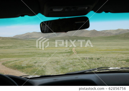 Mongolian landscape seen from inside the car Mongolian landscape seen from inside the car 62856756