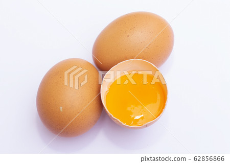 Three brown Eggs with one has broken isolated on Three brown Eggs with one has broken isolated on 62856866