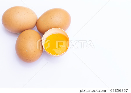 Four brown Eggs with one has broken isolated on Four brown Eggs with one has broken isolated on 62856867