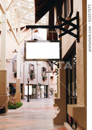 horizontal empty signage on clothes shop front 62857875