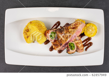 Restaurant meal on grey stone 62857949