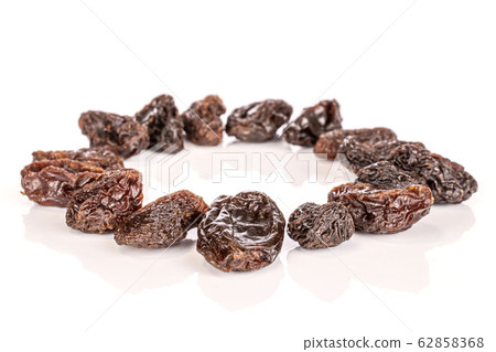 Dried dark raisin isolated on white Dried dark raisin isolated on white 62858368