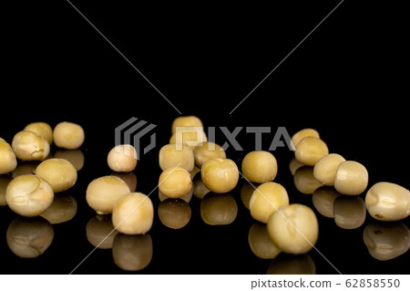 Canned pea isolated on black glass 62858550