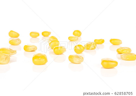 Yellow canned corn isolated on white Yellow canned corn isolated on white 62858705