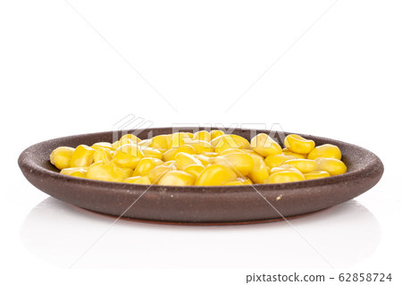 Yellow canned corn isolated on white 62858724
