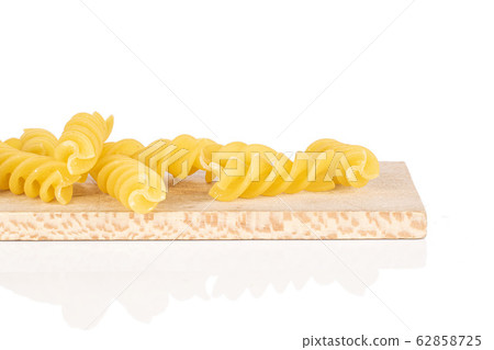 Yellow fusilli pasta isolated on white 62858725