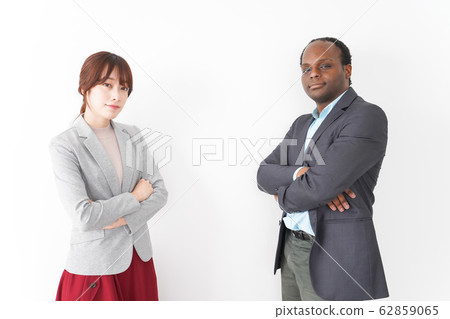 Two business harsons crossing arms 62859065