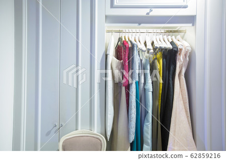 Fashion Design Clothes on Display rack in retail 62859216