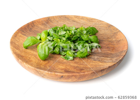 Fresh Green Chopped Basil Leaves Isolated on White 62859368