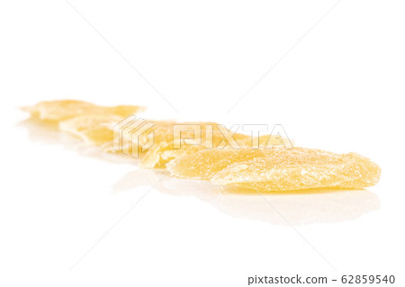 Dried yellow pineapple isolated on white Dried yellow pineapple isolated on white 62859540