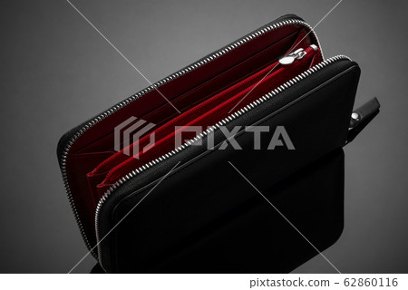 men's wallet on a black background 62860116