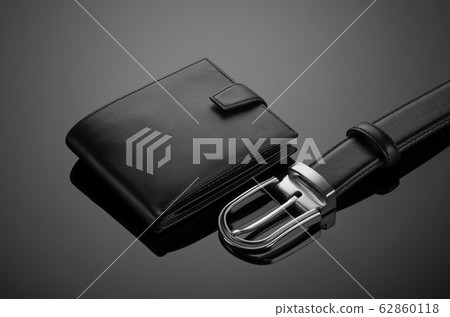men's wallet on a black background 62860118