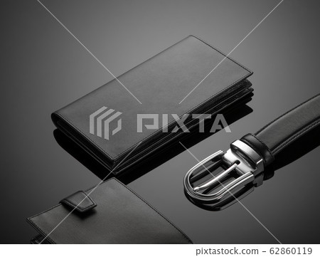 men's wallet on a black background 62860119