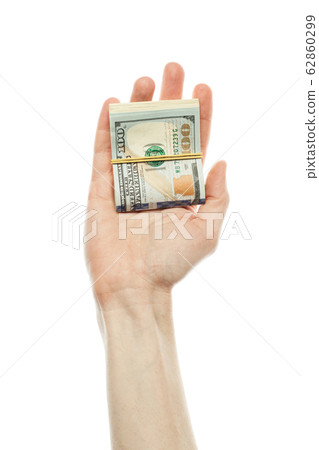 US dollars cash money in male hand isolated on 62860299