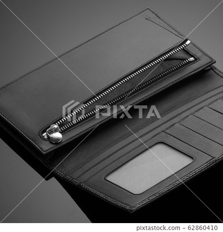 men's wallet on a black background men's wallet on a black background 62860410