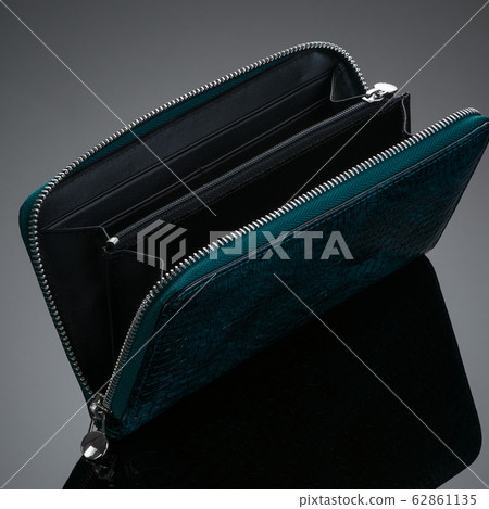 wallet on a black background 62861135