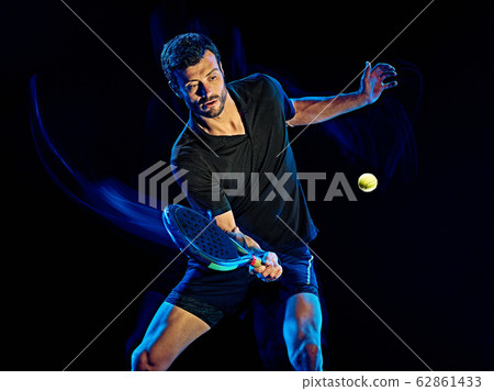 Paddle tennis player man light painting isolated black background 62861433