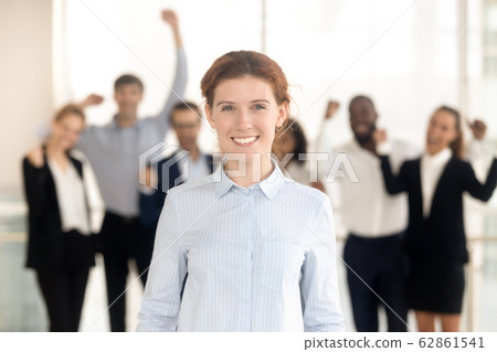 Close up portrait smiling millennial businesswoman in office. 62861541