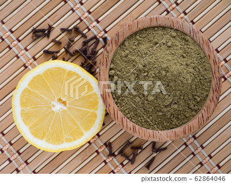 Henna powder and lemon on the bamboo mat Henna powder and lemon on the bamboo mat 62864046