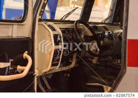 Military background headlight on an armored 62867574