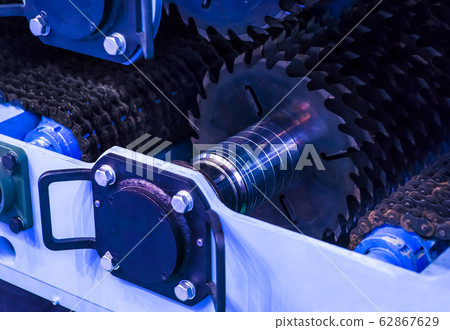Close-up of a carpenter using a circular saw to 62867629