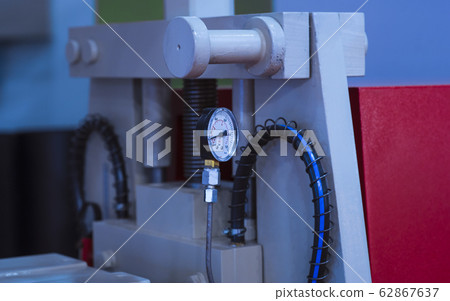 Pressure meter and red faucet with steel yellow 62867637