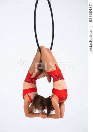 Twins female circus duo on the Aerial hoop isolated on white 62868487